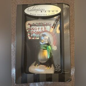 Christopher Radko Festive Penguin Ornament with Red and Green Accents